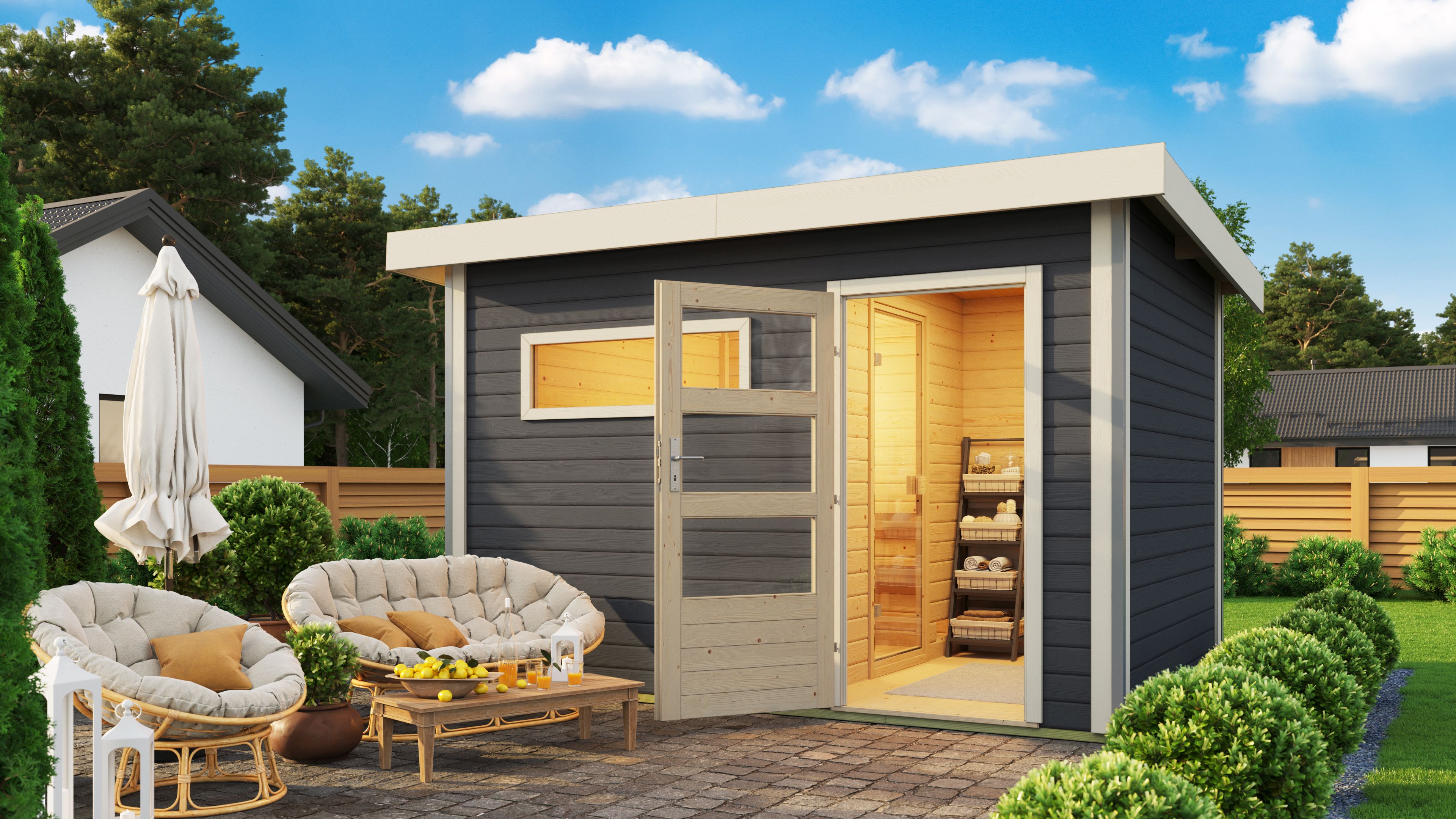 Karibu Saunahaus Skrollan 2 mit Vorraum als Gartensauna aus Massivholz im Garten mit Glasfront