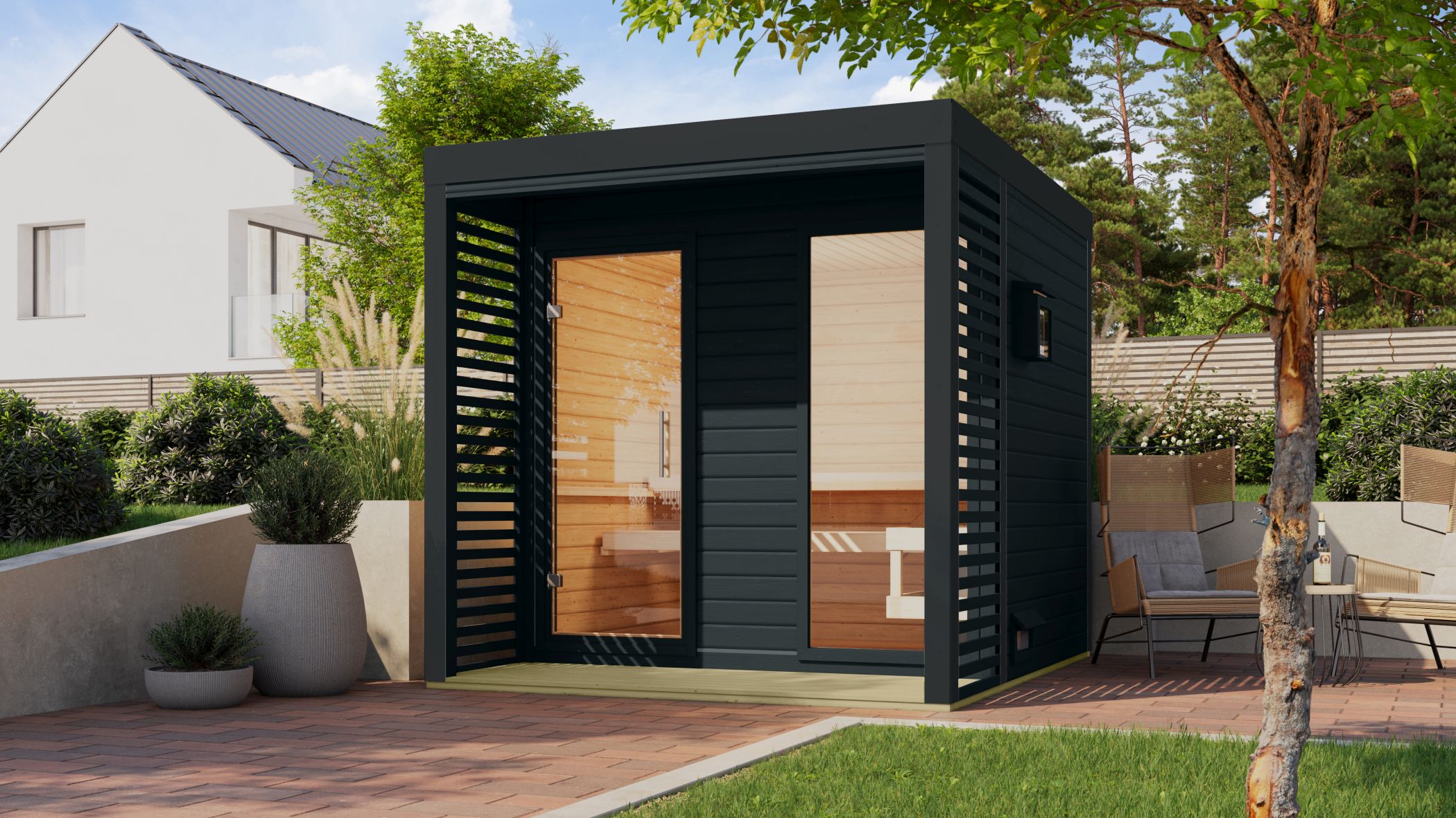 Karibu Saunahaus Ares 2 als Gartensauna aus Massivholz im Garten mit Glasfront