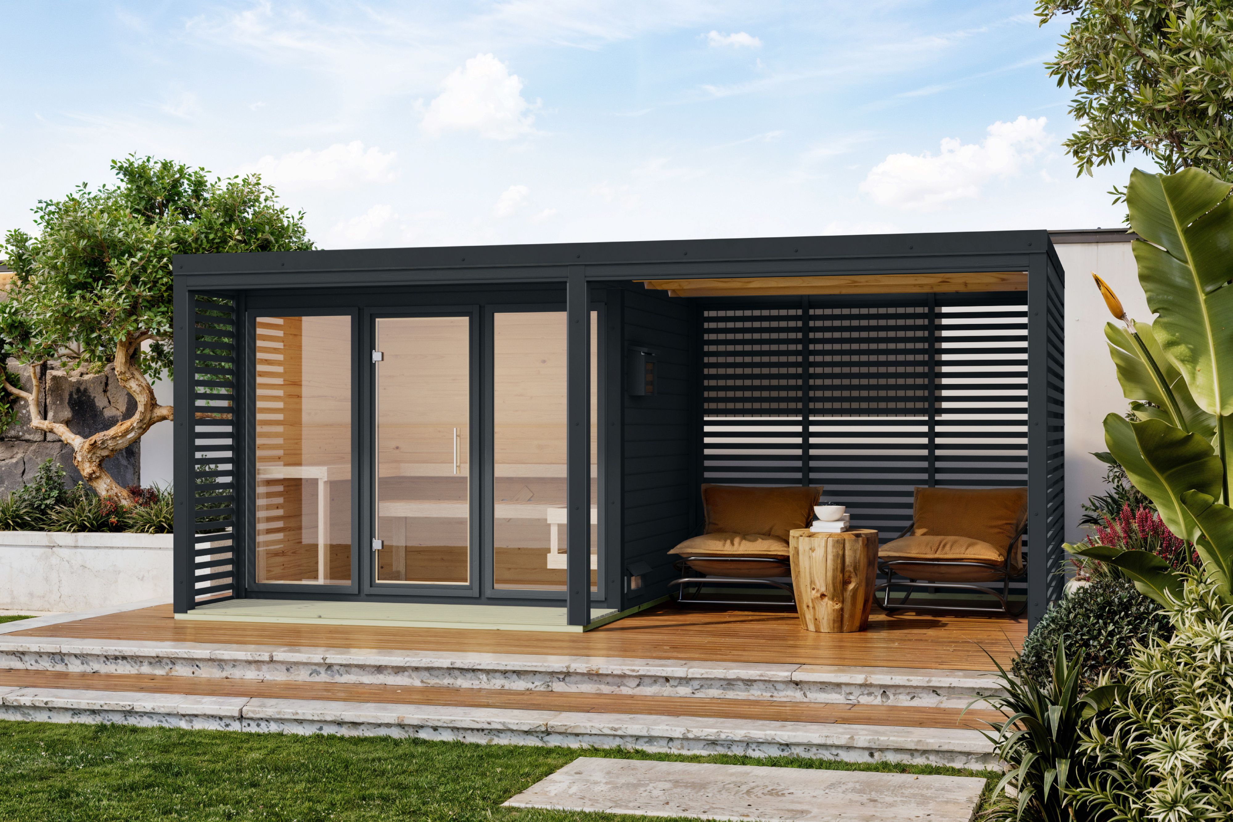 Karibu Saunahaus Ares 3 mit 2,70 m Anbaudach als Gartensauna aus Massivholz im Garten mit Glasfront