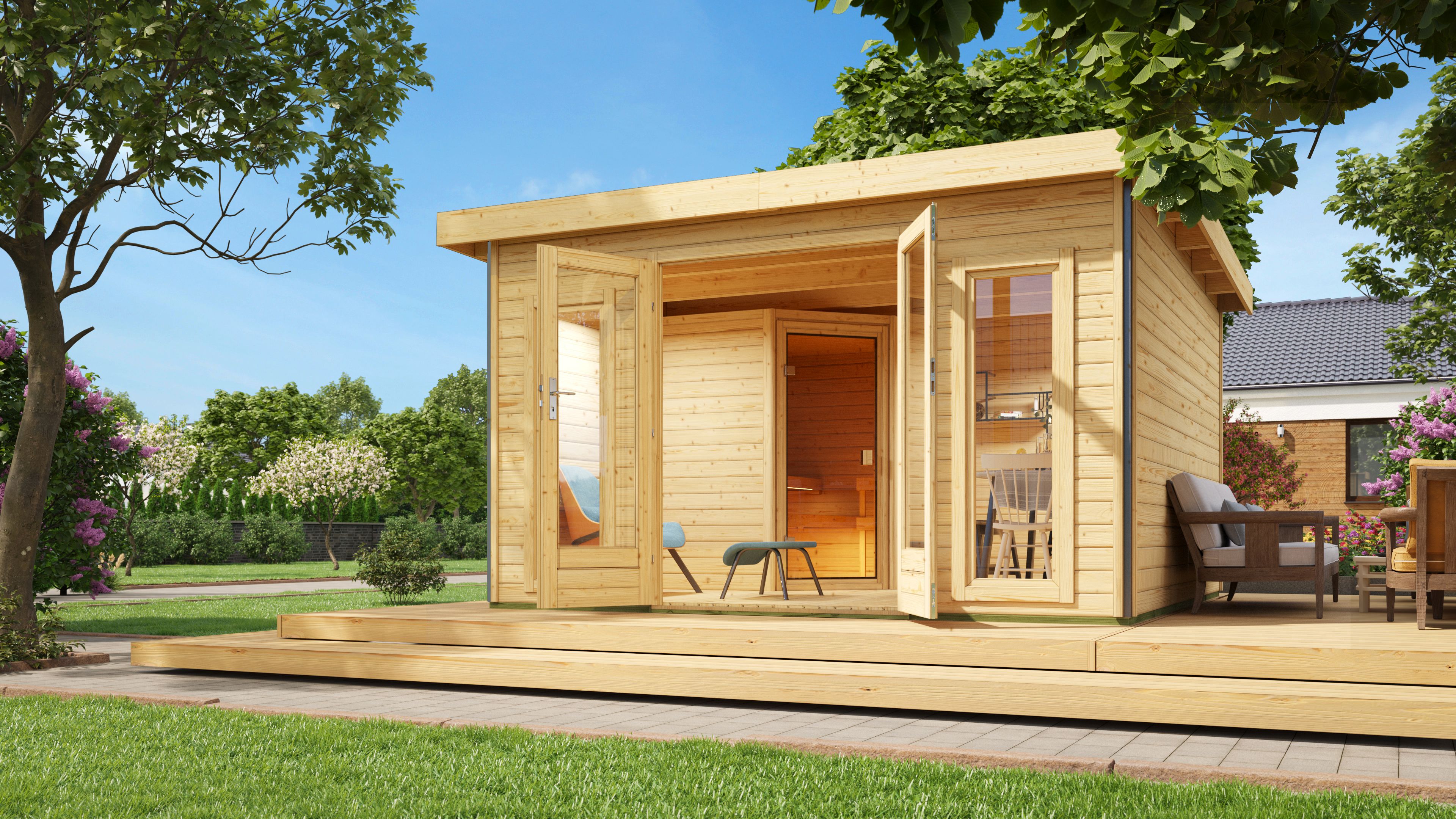 Karibu Saunahaus Mainburg 3 als Gartensauna aus Massivholz im Garten mit Glasfront